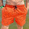 SHORT ELASTIC RESPINGOS PRETO E LARANJA